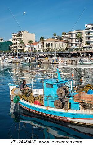 Fishermen and fishing boats in the harbour at Kalamata, Messinia, Southern Peloponnese, Greece,. View Large Photo Image Stock Photo - Fishermen and fishing boats in the harbour at Kalamata, Messinia, Southern Peloponnese, Greece,.. Fotosearch
