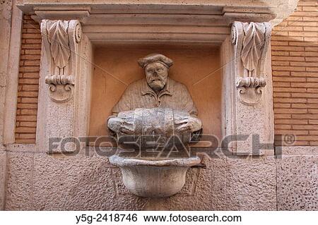 Fontana del Facchino Man holding barrel fountain in street road in rome italy View Large Photo Image Stock Photograph - Fontana del Facchino Man holding barrel fountain in street road in rome italy. Fotosearch