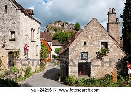 Stock Photo - France, Quercy, Lot 46, Saint-Cirq-Lapopie village. Fotosearch