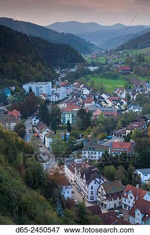 Stock Photo - Germany, Baden-Wurttemburg, Black Forest, Hornberg, elevated town view, dusk.. Fotosearch