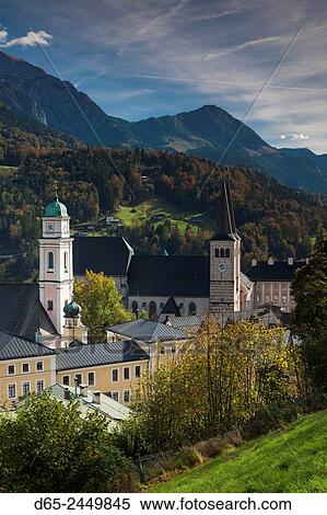 Stock Photography - Germany, Bavaria, Berchtesgaden, elevated town view with St. Andreas Pfarrkirche and Stiftskirche Sts. Peter and Johannes churches.. Fotosearch