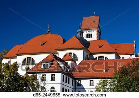 Germany, Bavaria, Fussen, St. Mang Abbey from the Lech River. View Large Photo Image Stock Photo - Germany, Bavaria, Fussen, St. Mang Abbey from the Lech River.. Fotosearch