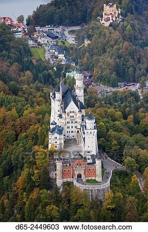 Stock Image - Germany, Bavaria, Hohenschwangau, Schloss Neuschwanstein castle, elevated view, fall.. Fotosearch