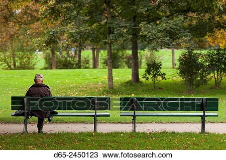 Germany Bavaria Munich Englischer Garten Park Reading On The