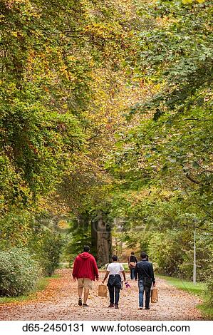 Germany Bavaria Munich Englischer Garten Park Visitors Fall