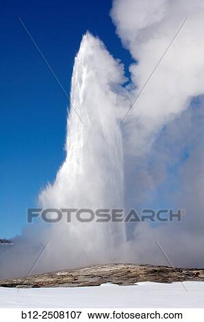 Geyser Old Faithful, hot springs in winter, Yellowstone National Park, USA View Large Photo Image Stock Photo - Geyser Old Faithful, hot springs in winter, Yellowstone National Park, USA. Fotosearch