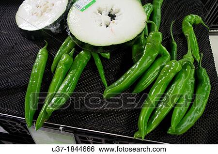Giant green chilli for sale at Guangzhou wet market, China. View Large Photo Image Stock Photograph - Giant green chilli for sale at Guangzhou wet market, China.. Fotosearch