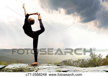 Girl excercising, mountain top View Large Photo Image Stock Photo - Girl excercising, mountain top. Fotosearch