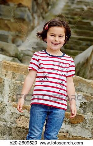 Stock Image - Girl in the fishing port. Getaria. Gipuzkoa. Basque Country. Spain. Fotosearch
