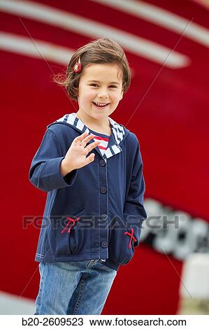 Stock Image - Girl in the fishing port. Getaria. Gipuzkoa. Basque Country. Spain. Fotosearch