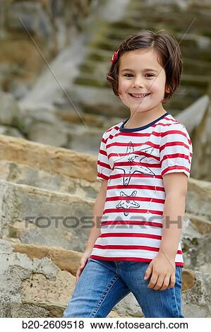 Girl in the fishing port. Getaria. Gipuzkoa. Basque Country. Spain View Large Photo Image Stock Photo - Girl in the fishing port. Getaria. Gipuzkoa. Basque Country. Spain. Fotosearch
