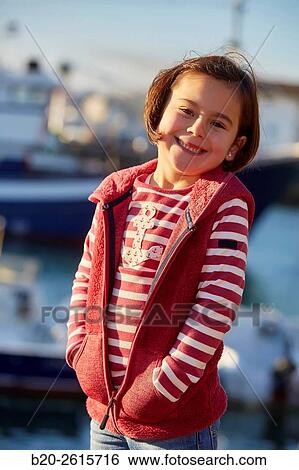 Girl in the fishing port. Hondarribia. Gipuzkoa. Basque Country. Spain View Large Photo Image Stock Photograph - Girl in the fishing port. Hondarribia. Gipuzkoa. Basque Country. Spain. Fotosearch