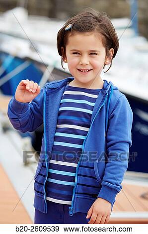 Girl in the marina. Port. Getaria. Gipuzkoa. Basque Country. Spain View Large Photo Image Stock Photo - Girl in the marina. Port. Getaria. Gipuzkoa. Basque Country. Spain. Fotosearch