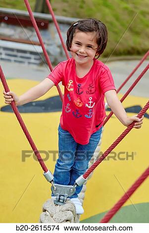 Girl. Playground. Getaria. Gipuzkoa. Basque Country. Spain View Large Photo Image Picture - Girl. Playground. Getaria. Gipuzkoa. Basque Country. Spain. Fotosearch