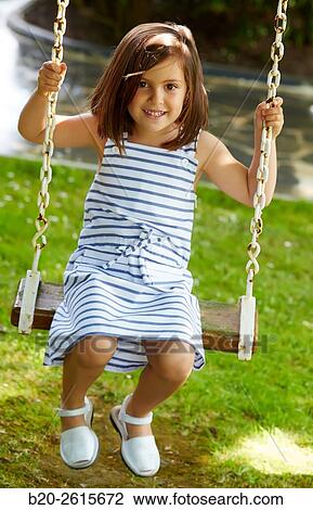 Girl playing in the park. Getaria. Gipuzkoa. Basque Country. Spain View Large Photo Image Stock Image - Girl playing in the park. Getaria. Gipuzkoa. Basque Country. Spain. Fotosearch