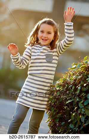 Girl playing in the park. Zumaia. Gipuzkoa. Basque Country. Spain View Large Photo Image Stock Photo - Girl playing in the park. Zumaia. Gipuzkoa. Basque Country. Spain. Fotosearch
