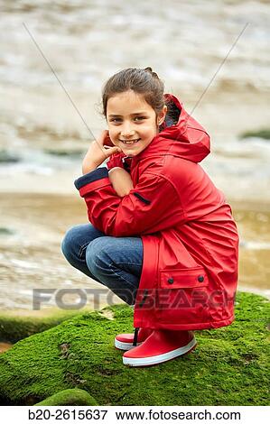 Girl playing on the beach. Getaria. Gipuzkoa. Basque Country. Spain View Large Photo Image Stock Photo - Girl playing on the beach. Getaria. Gipuzkoa. Basque Country. Spain. Fotosearch