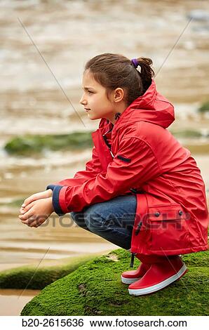 Girl playing on the beach. Getaria. Gipuzkoa. Basque Country. Spain View Large Photo Image Stock Photograph - Girl playing on the beach. Getaria. Gipuzkoa. Basque Country. Spain. Fotosearch