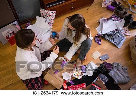 Stock Photo - girls with gifts, Valencia, spain. Fotosearch