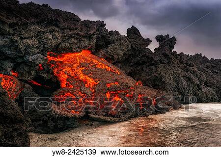 Glowing Lava flowing, Holuhraun Fissure Eruption, Bardarbunga Volcano, Iceland. View Large Photo Image Stock Photo - Glowing Lava flowing, Holuhraun Fissure Eruption, Bardarbunga Volcano, Iceland.. Fotosearch