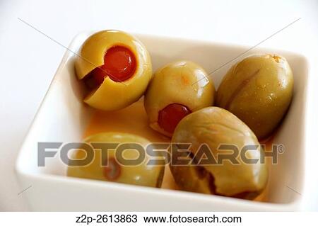 Green olives on white bowl appetizer Spain. View Large Photo Image Stock Image - Green olives on white bowl appetizer Spain.. Fotosearch