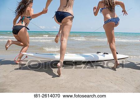 group of girls and boy running on the beach in Castellon. Espaa View Large Photo Image Stock Image - group of girls and boy running on the beach in Castellon. Espaa. Fotosearch