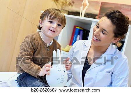 Hand child. Congenital hand. Doctor attending to patient medical consultation. Office. Plastic surgery. Pediatrician. View Large Photo Image Stock Photo - Hand child. Congenital hand. Doctor attending to patient medical consultation. Office. Plastic surgery. Pediatrician.. Fotosearch