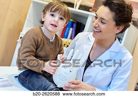 Hand child. Congenital hand. Doctor attending to patient medical consultation. Office. Plastic surgery. Pediatrician. View Large Photo Image Stock Photo - Hand child. Congenital hand. Doctor attending to patient medical consultation. Office. Plastic surgery. Pediatrician.. Fotosearch