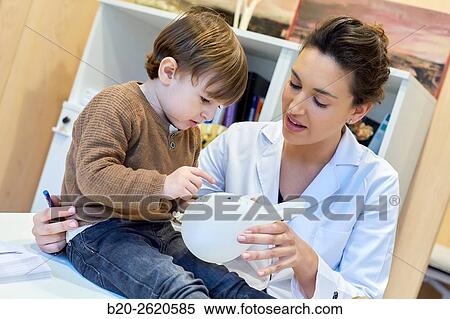 Hand child. Congenital hand. Doctor attending to patient medical consultation. Office. Plastic surgery. Pediatrician. View Large Photo Image Stock Photography - Hand child. Congenital hand. Doctor attending to patient medical consultation. Office. Plastic surgery. Pediatrician.. Fotosearch