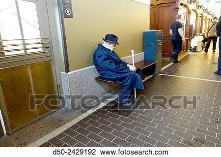 HELSINKI, FINLAND Elderly man waiting for a taxi. View Large Photo Image Stock Image - HELSINKI, FINLAND Elderly man waiting for a taxi.. Fotosearch