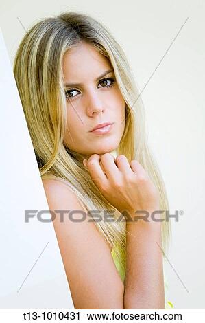 Holding head blonde girl portrait View Large Photo Image Stock Image - Holding head blonde girl portrait. Fotosearch