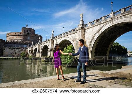 Italian, romance, romantic, vacation, honeymooning, holiday, visit, visiting, newlyweds, just, married, white, prewedding, pre, post, engaged, fiancee, portrait, two people, castel, castle, santangelo, sant angelo, Rome, Roman, Italy, Italian, Tiber, rive View Large Photo Image Picture - Italian, romance, romantic, vacation, honeymooning, holiday, visit, visiting, newlyweds, just, married, white, prewedding, pre, post, engaged, fiancee, portrait, two people, castel, castle, santangelo, sant angelo, Rome, Roman, Italy, Italian, Tiber, rive. Fotosearch