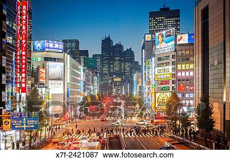 Stock Photo - Koshukaido Avenue, in background Park Tower, Shinjuku, Tokyo.. Fotosearch
