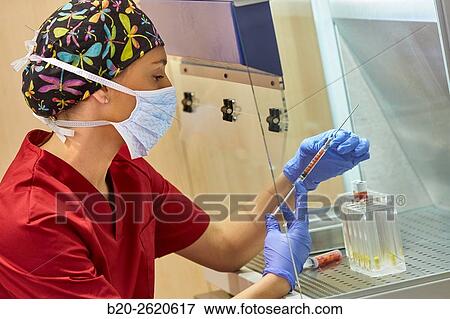 Stock Photo - Lipofilling. Fat Grafting. Liposculpture. Lipofilling is based on patients own fat transfer to another area, either for body shaping and facial rejuvenation. The fat is removed by liposuction of the donor site, usually lower abdomen or thighs. Subsequentl. Fotosearch