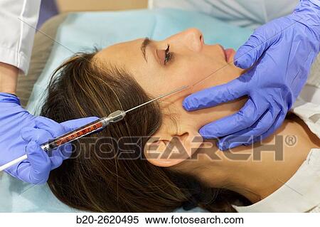 Lipofilling. Fat Grafting. Liposculpture. Lipofilling is based on patients own fat transfer to another area, either for body shaping and facial rejuvenation. The fat is removed by liposuction of the donor site, usually lower abdomen or thighs. Subsequentl View Large Photo Image Stock Photography - Lipofilling. Fat Grafting. Liposculpture. Lipofilling is based on patients own fat transfer to another area, either for body shaping and facial rejuvenation. The fat is removed by liposuction of the donor site, usually lower abdomen or thighs. Subsequentl. Fotosearch