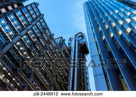 Stock Image - Lloyds building at night, detail. City of London, England.. Fotosearch