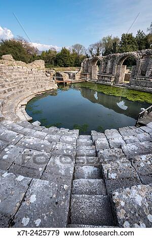 Looking across the remains of the 4th century BC Theatre at Butrint in Southern Albania. View Large Photo Image Stock Photo - Looking across the remains of the 4th century BC Theatre at Butrint in Southern Albania.. Fotosearch