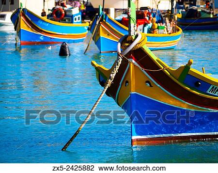 Luzzu traditional Maltese fishing boat - Marsaxlokk, Malta. View Large Photo Image Stock Image - Luzzu traditional Maltese fishing boat - Marsaxlokk, Malta.. Fotosearch