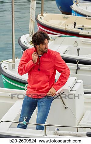 Man in the marina. Port. Getaria. Gipuzkoa. Basque Country. Spain View Large Photo Image Picture - Man in the marina. Port. Getaria. Gipuzkoa. Basque Country. Spain. Fotosearch