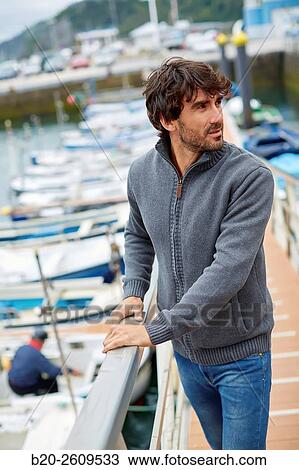 Man in the marina. Port. Getaria. Gipuzkoa. Basque Country. Spain View Large Photo Image Stock Image - Man in the marina. Port. Getaria. Gipuzkoa. Basque Country. Spain. Fotosearch