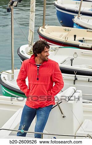 Man in the marina. Port. Getaria. Gipuzkoa. Basque Country. Spain View Large Photo Image Stock Photograph - Man in the marina. Port. Getaria. Gipuzkoa. Basque Country. Spain. Fotosearch