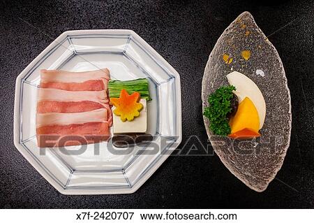 Stock Photo - Meat, tofu and vegetables. Traditional food, Fujiya Ryokan accommodation, Kawayu Onsen, Kumano Kodo, Nakahechi route, Wakayama, Kinki, Japan.. Fotosearch