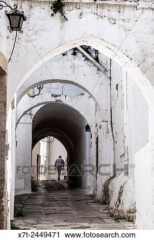 Medieval whitewashed streets of Ostuni, Puglia, Italy. View Large Photo Image Stock Image - Medieval whitewashed streets of Ostuni, Puglia, Italy.. Fotosearch