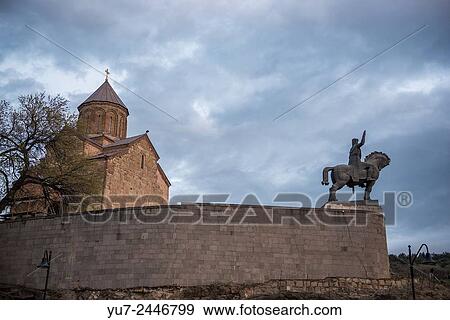 Metekhi Church of Assumption and statue of Vakhtang I Gorgasali (Wolf Head) in Tbilisi, Georgia. View Large Photo Image Stock Photo - Metekhi Church of Assumption and statue of Vakhtang I Gorgasali (Wolf Head) in Tbilisi, Georgia.. Fotosearch