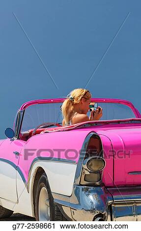 Miami Beach. Florida. Usa. Woman in a vintage car View Large Photo Image Stock Image - Miami Beach. Florida. Usa. Woman in a vintage car. Fotosearch