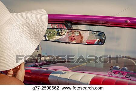 Miami Beach. Florida. Usa. Woman in a vintage car View Large Photo Image Stock Image - Miami Beach. Florida. Usa. Woman in a vintage car. Fotosearch