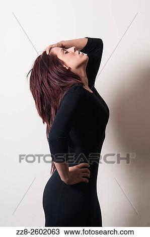 Miserable woman hand on head. View Large Photo Image Stock Image - Miserable woman hand on head.. Fotosearch