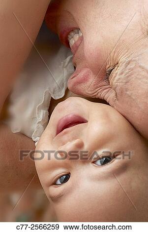 Mom with baby View Large Photo Image Stock Photo - Mom with baby. Fotosearch