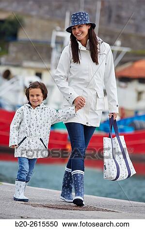 Mother and daughter in the fishing port. Getaria. Gipuzkoa. Basque Country. Spain View Large Photo Image Stock Image - Mother and daughter in the fishing port. Getaria. Gipuzkoa. Basque Country. Spain. Fotosearch