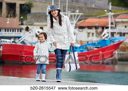Mother and daughter in the fishing port. Getaria. Gipuzkoa. Basque Country. Spain View Large Photo Image Stock Photo - Mother and daughter in the fishing port. Getaria. Gipuzkoa. Basque Country. Spain. Fotosearch